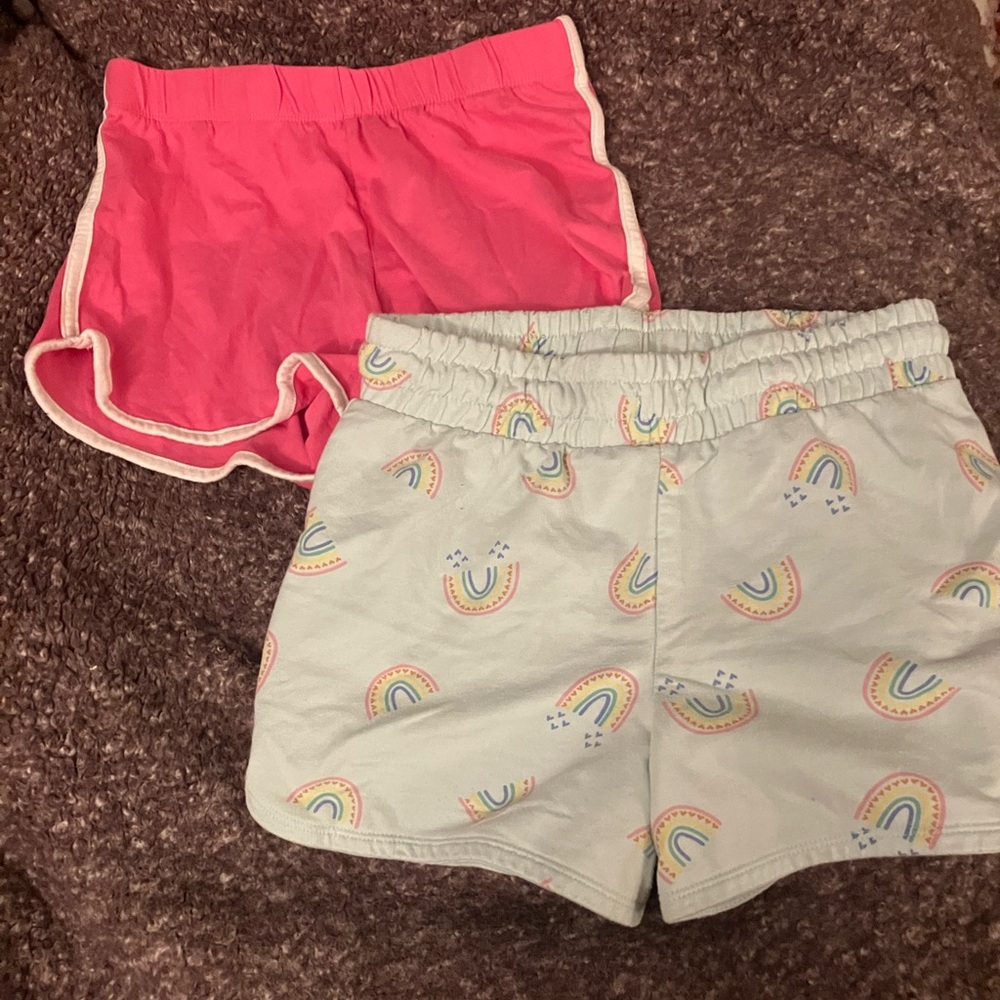 Two pairs of slightly worn size 14/16 shorts.